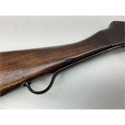 19th century Enfield Mk.IV .577 450 with Martini action, altered to a smooth bored 20-bore shot gun, the 82cm barrel with two barrel bands and original ramrod under, nitro proofed, the action marked with Victoria cypher Enfield 1886 IV, cocking indicator, Indian markings under trigger guard, fitted with Wilkinson sword bayonet in scabbard and leather sling NVN L125cm excluding bayonet SHOTGUN CERTIFICATE REQUIRED