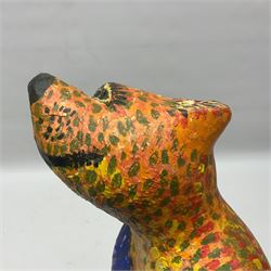 Helen Skelton (British 1933 – 2023): Two carved wooden abstract sculptures, one modelled as a dog, the other modelled as a bear, both with painted stippled decoration, largest H20cm. Born into an RAF family in 1933 in Kent and travelled the world extensively during her childhood. After settling in Bridlington, Helen immersed herself in painting, textiles, and wood sculpture, often inspired by nature's beauty. Her talent was showcased in a one-woman show at Sewerby Hall and recognised with the sculpture prize at Ferens Art Gallery in 2000. Sadly, Helen’s daughter passed away from cancer in 2005. This loss inspired Helen to donate her sculptures to Marie Curie upon her passing in 2023.