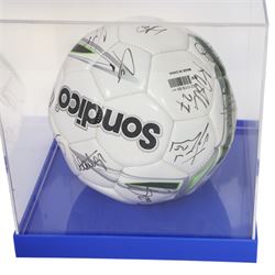 Sondico football signed at the Den by the Millwall football team December 2012, contained within a Perspex display case