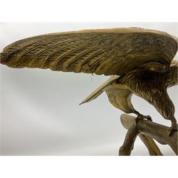 Large brass figure of an eagle on a branch, H51.5cm