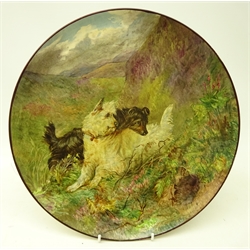  Late 19th century circular charger hand painted moorland scene with two dogs beside a rabbit hole, probably Taylor Tunnicliffe & Co, signed to reverse Helen Power, 1880, D36cm   