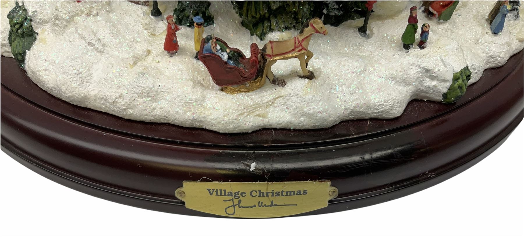 A collection of illuminating Christmas decorations, including Hawthorne Village decorations by Thomas Kinkade, Candle holders Winter Wonderland, a wreath candleholders Holiday Gathering, Village Christmas illuminated tree sculpture H39cm and Santa's on his Way, along with A Very Beary Christmas illuminated tree 33cm, and three other illuminating Christmas decorations, all with plugs. 