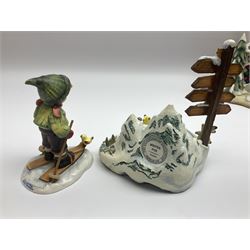 Eight Christmas Hummel figures by Goebel, to include Wintertime Chapel candle holder, Winter Fun, Christmas Morning, Christmas Time and Gingerbread Lane, tallest H21cm