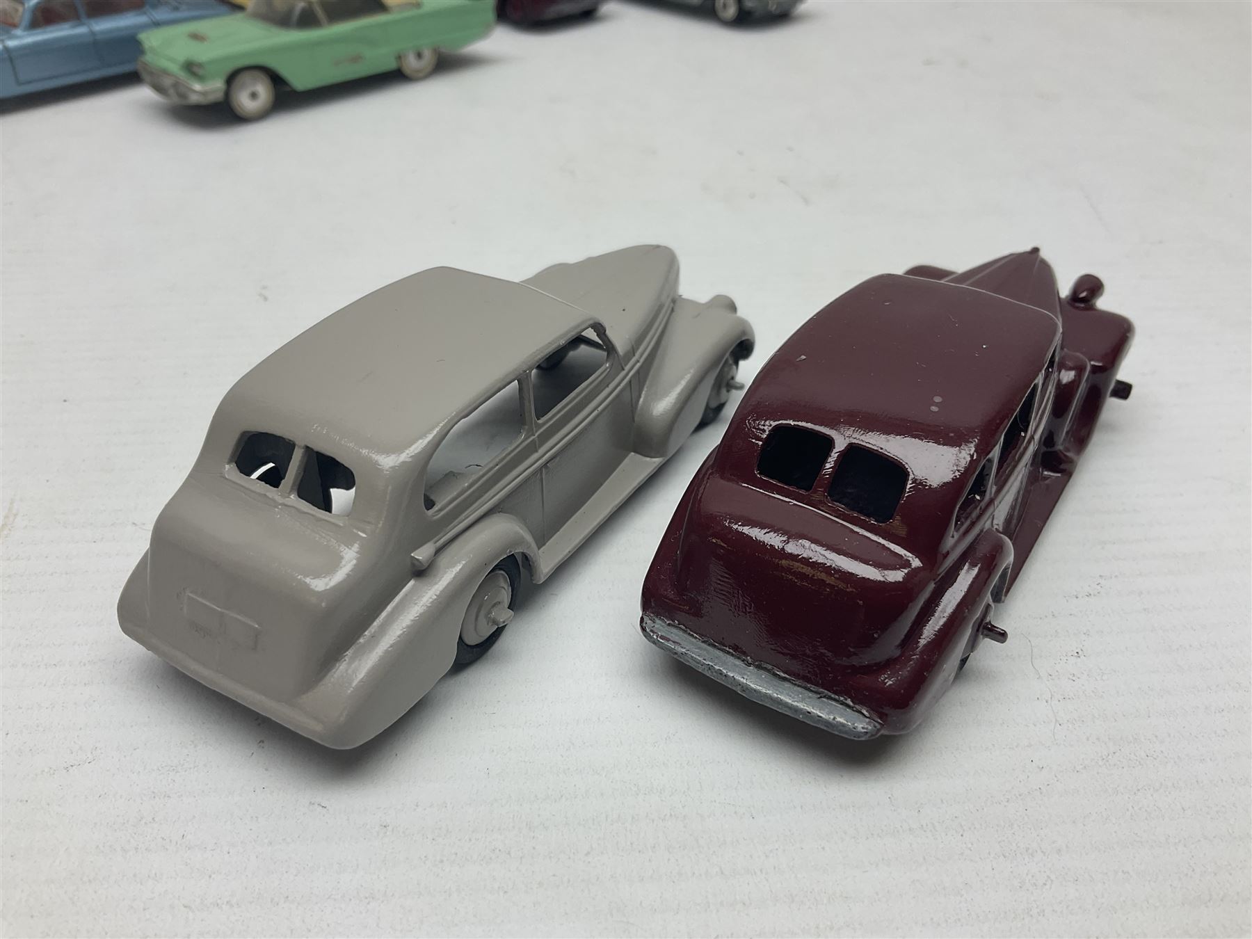 Eleven unboxed and playworn early die-cast models including Dinky Packard, Buick, two Jaguar Mark X and estate wagon, Corgi Mercedes-Benz 300S.L. Roadster, Ford Thunderbird, Citroen DS19 and Bentley Continental Sports Saloon, Spot-On Armstrong Siddeley Sapphire etc; all unboxed (11)