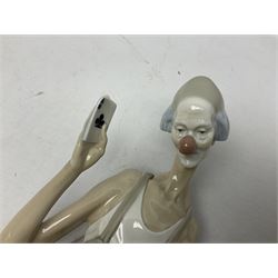 Lladro figure, Magic, modelled a seated clown with young girl showing card trick, sculpted by Salvador Furio, no 4605, with original box, year issued 1969, year retired 1985, H39cm