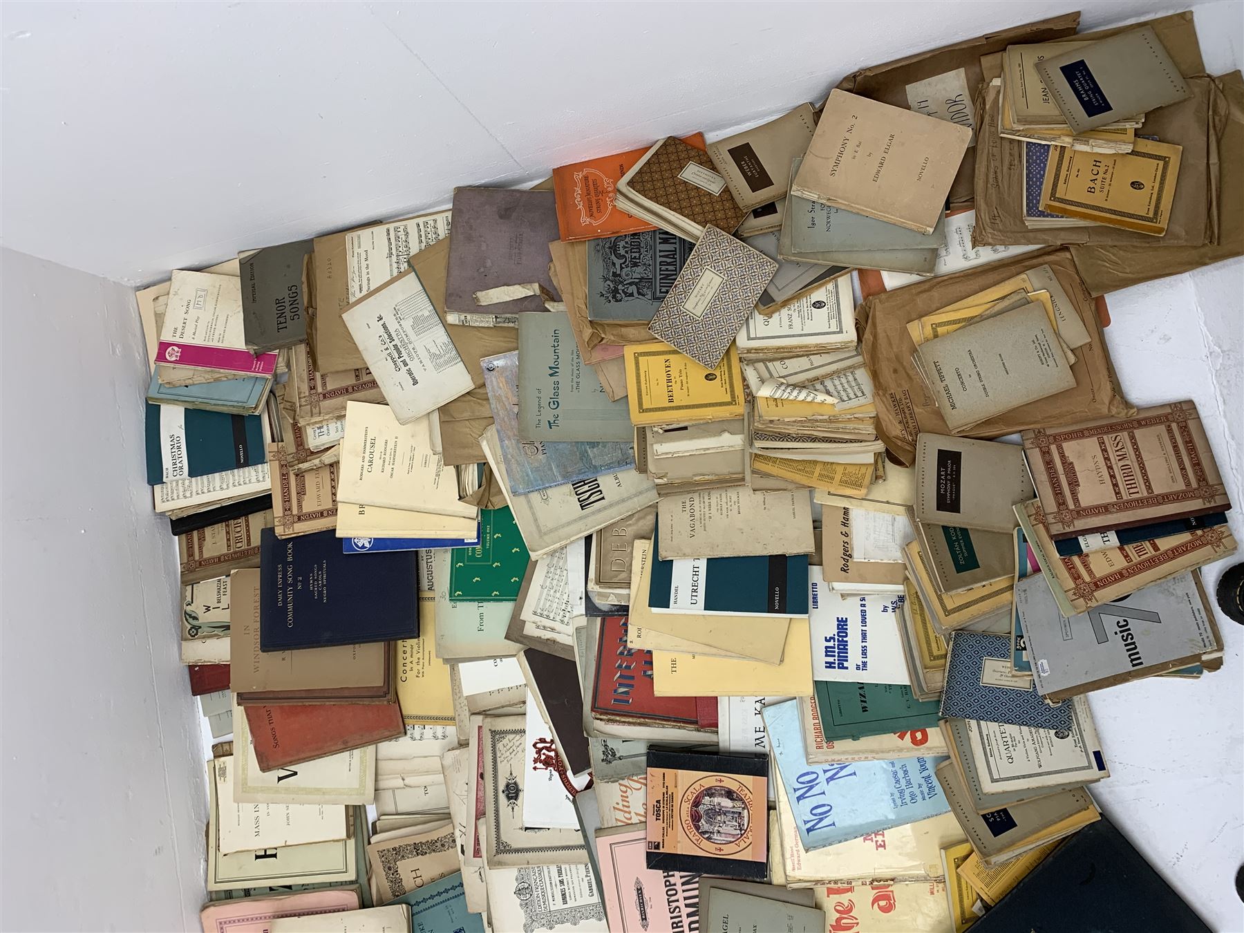 Steinway & Sons - late 19th century figured walnut upright piano, iron framed and overstrung, model no. 56174 circa. 1886, W154cm, H137cm, D70cm, together with a quantity of sheet music