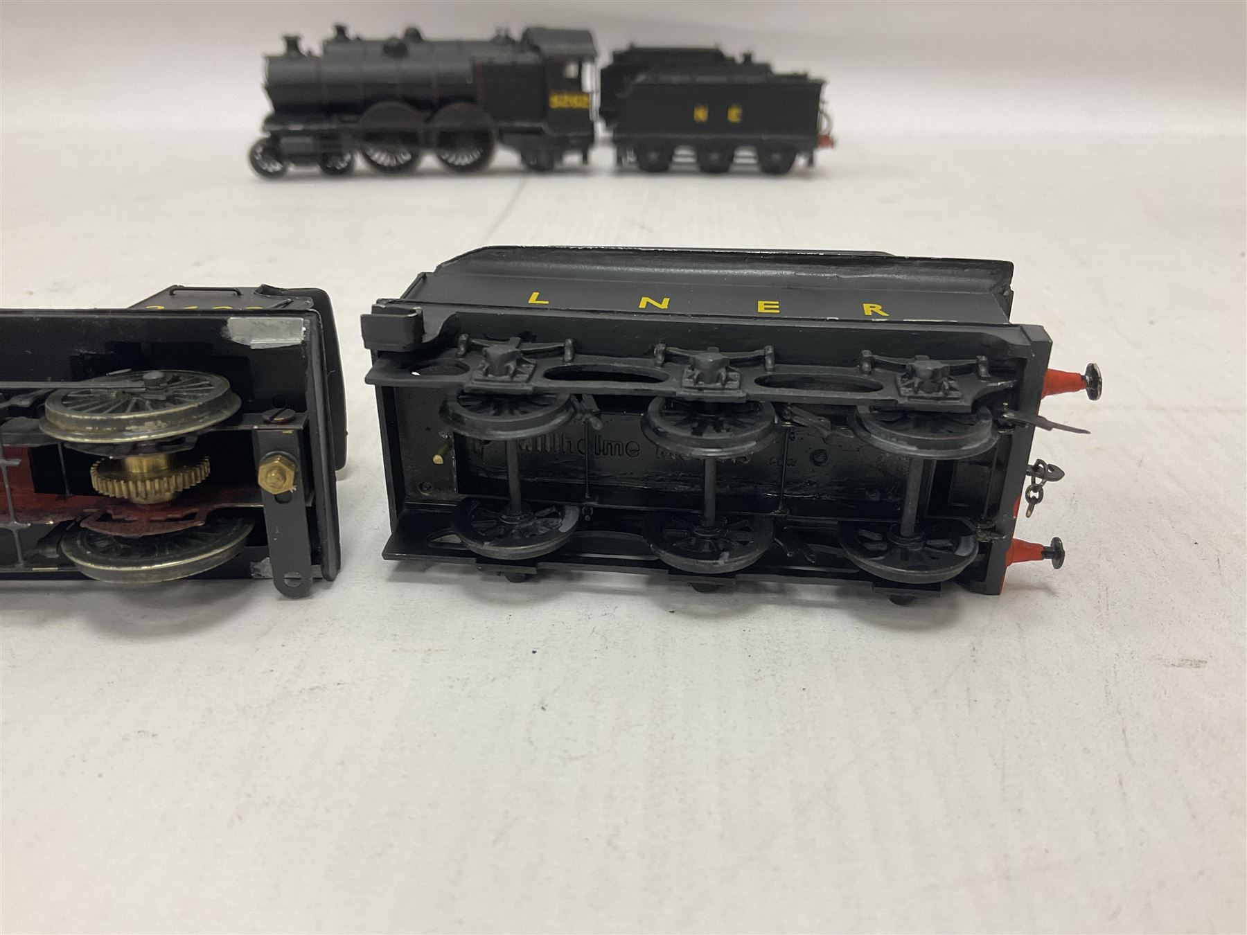 ‘00’ gauge - three kit built locomotive and tenders comprising Class D21 4-4-0 no.1242 finished in NER black with LNER tender; Class C4 4-4-2 no.5262 finished in LNER black; Coal Engines Class 0-6-0 no.2408 finished in black with Millholme Models LNER tender (3) 