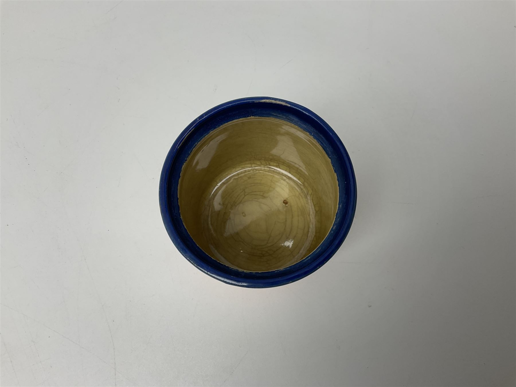 Clarice Cliff Fantasque for Wilkinson Pottery preserve pot, circa 1928, of drum form decorated in Sunray Leaves pattern, H8cm