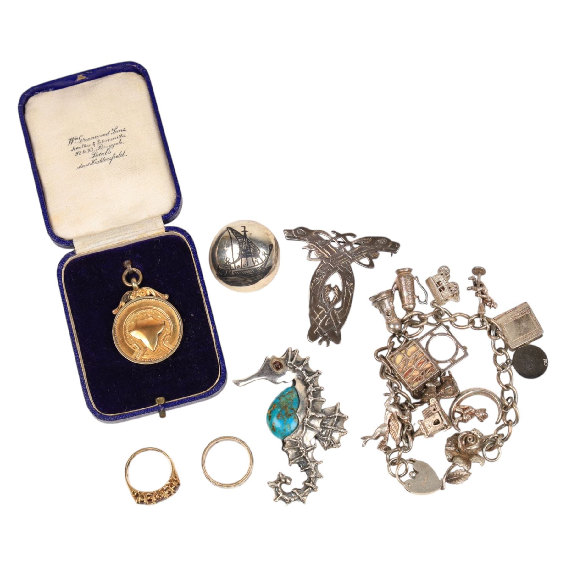 9ct gold stone set ring, hallmarked, 9ct and silver ring, silver charm bracelet, silver brooches and silver-gilt fob, all stamped or hallmarked