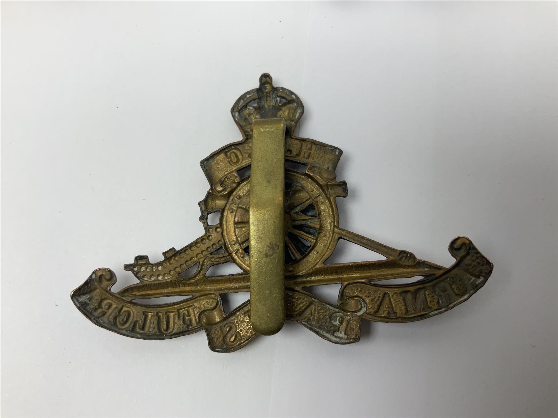 Twelve cap badges including Royal Artillery, 3rd RGA Middlesex Volunteers, Hon. Artillery Company, West Riding and Waraickshire Royal Horse Artillery, Royal Engineers and Army Service Corps (12)