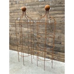 Pair of Country House wrought iron garden obelisks with ball finial, raise in four tiers