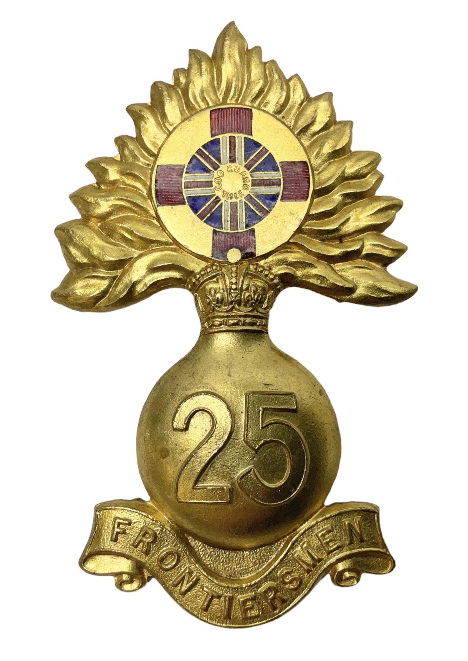 WW1 25th Battalion (Frontiersmen) City of London Royal Fusiliers Cap Badge; gilt brass fused grenade with 25 to the centre; circular section to the flames with red enamel cross and enamel union flag with GOD GUARD THEE to the centre; lower scroll with FRONTIERSMEN; two lug fittings verso.