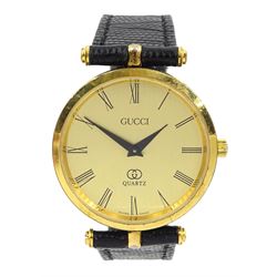Gucci Shelly Line quartz wristwatch, gilt dial with GG logo back case, boxed