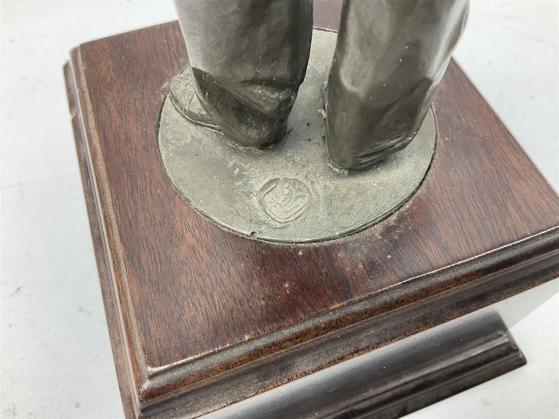 Presentation bronzed figure of a paratrooper by Peter Hicks mounted on a mahogany plinth with plaque inscribed ' Presented to Lieutenant General Sir Michael Gray KCB OBE President Army Parachute Association 1981-1987 An Outstanding Term of Leadership Friendship and Humour. Thank You All Ranks A.P.A.' H28cm; a brass Pegasus plaque H12cm; and small quantity of colour photographs and prints of military related paintings