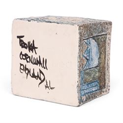 Troika cube vase by Anne Lewis, with geometric incised decoration in blue on a mottled blue ground, signed to base with initials
