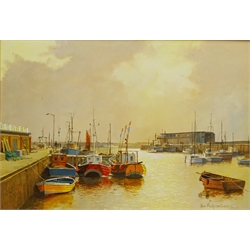  Don Micklethwaite (British 1936-): Bridlington Harbour at Sunrise, oil on canvas board signed 34cm x 49.5cm  