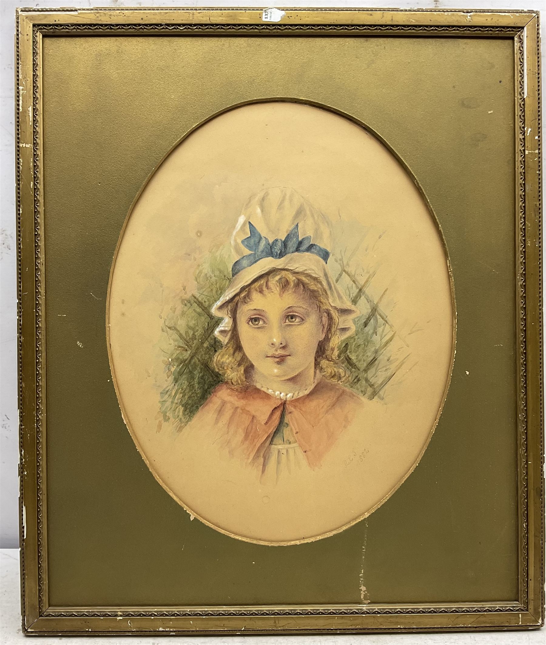 Rosina Emmet Sherwood (American 1854-1948): Girl in a White Bonnet, oval watercolour signed with initials and dated 1882, 41cm x 32cm