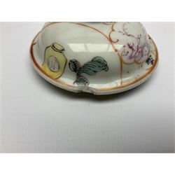 Two late 18th/early 19th century Chinese export teapots, the largest example of globular form with curved handle and straight spout, decorated in the Mandarin style with figural scenes surrounded by red scale reserves, H13.5cm, the second smaller example decorated in underglaze blue with two musicians in a landscape set with willow tree and fence, H10.5cm

