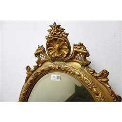  19th centruy gilt framed girandole mirror, oval plate with three candle branches, W44cm, H80cm  