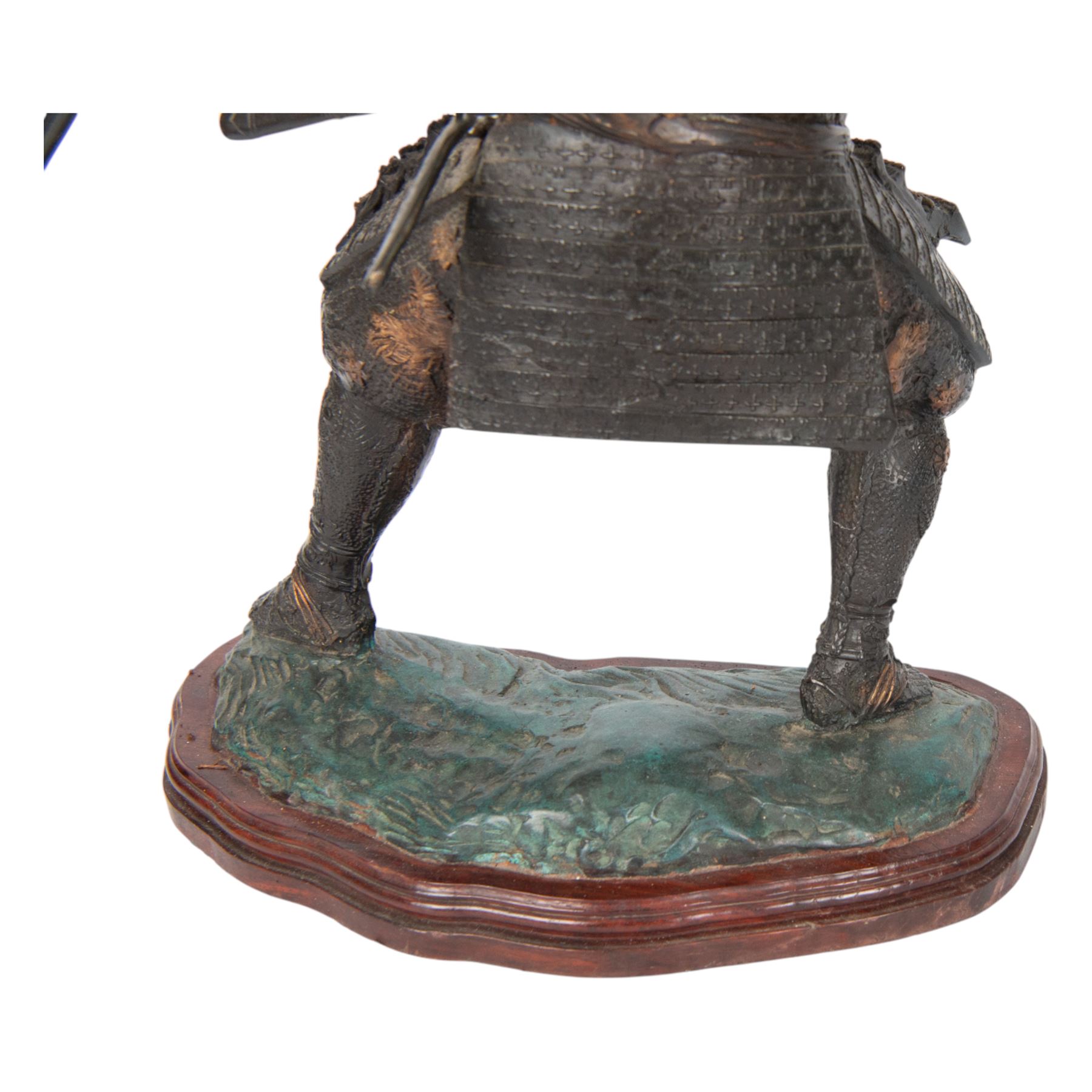 Japanese bronze of a Samurai, possibly Meiji period, standing holding a three pronged spear, on a wave form base, H67cm