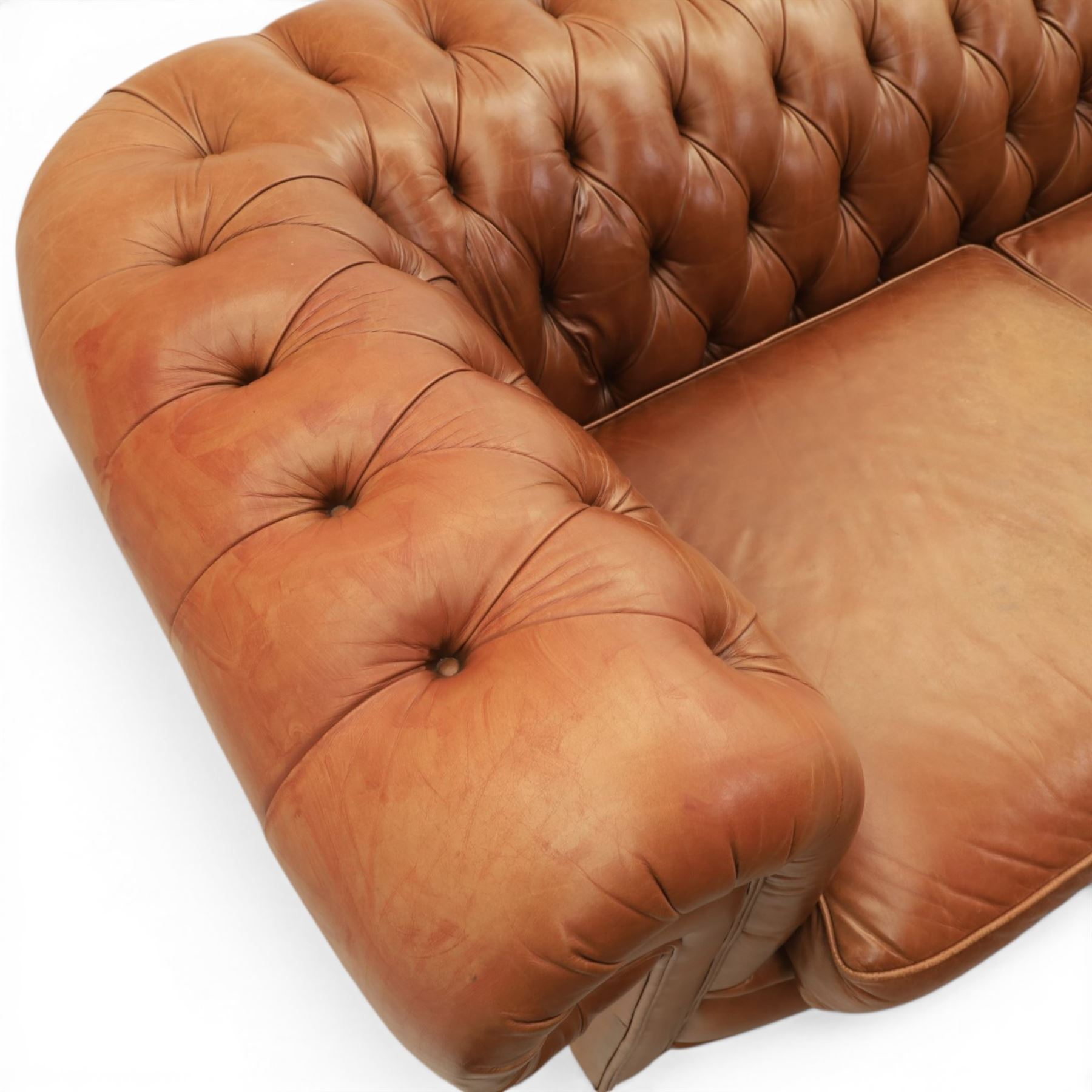 Springvale - Large three seat Chesterfield sofa, upholstered in buttoned tan leather, two cushion deep seat, turned bun feet