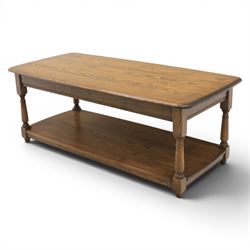 Ercol -  dark elm corner TV stand and coffee table, TV stand with drop triangular leaf, over open recess above a single drawer (H 47cm, D 44cm with leaf 79cm, W 73cm,  the coffee table with chamfered rectangular top with full length undertier, raised on turned supports (H 43cm, D 54cm, W 115cm) 