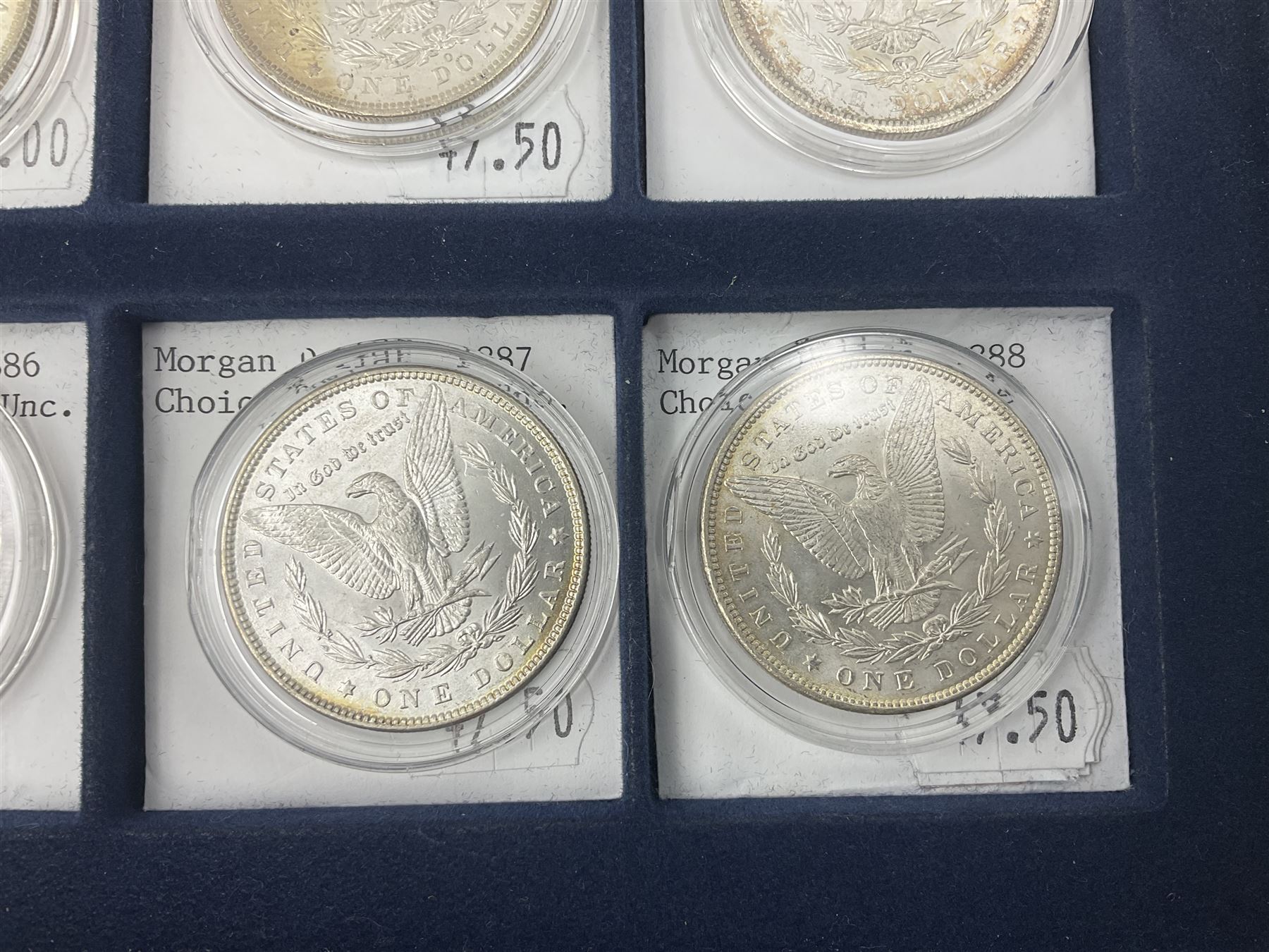 Twelve United States of America silver Morgan dollar coins, dated 1878 S, 1879 S, 1880 S, 1881 S, 1882 O, 1883 O, 1884 O, 1884 CC, 1885 O, 1886, 1887 and 1888