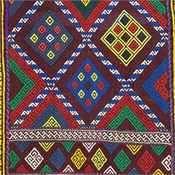 Central Asian Suzani kilim flatweave runner, decorated with a repeating diamond lattice enclosing polychrome geometric motifs within yellow key fret borders, fringe ends 