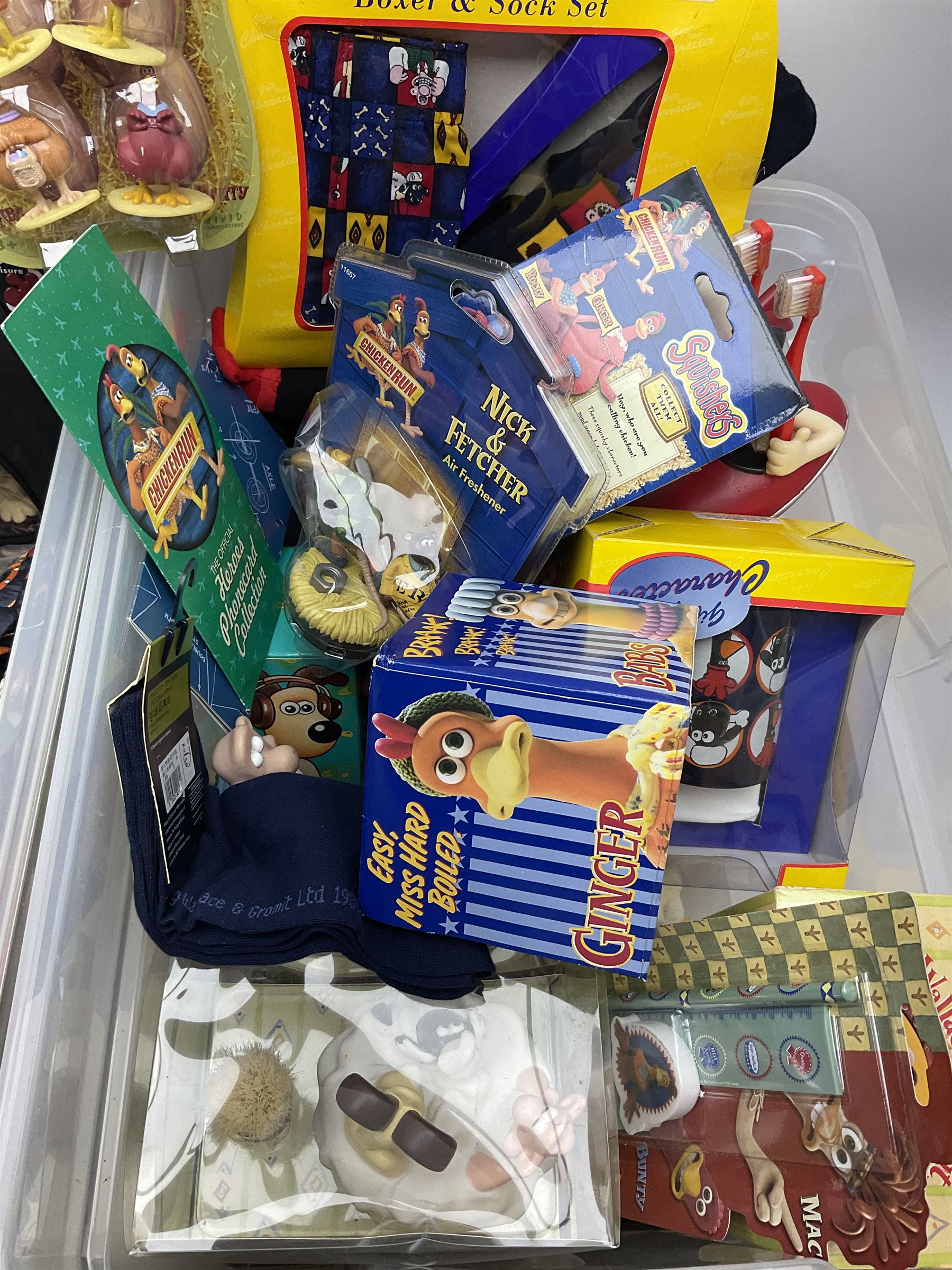 Quantity of Wallace and Gromit toys, accessories and memorabilia including soft toys, figurines, electronic ‘Talking Wallace’, car screen shades, and a quantity of Chicken Run Related merchandise, in three boxes
