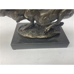 Bronze figure group, modelled as two hares in chase, after 'Nick', with foundry mark, upon a rectangular base, H11cm L15cm