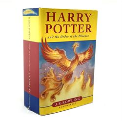 Rowling J.K.: Harry Potter and The Order of the Phoenix. 2003. First edition. Bears facsimile signature to the half title page. Unclipped dustjacket.