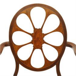 Hampton & Sons (Pall Mall 1830-1957) - Pair of Edwardian inlaid mahogany wheel-back elbow chairs, the pierced oval backs with chequered stringing and cross banding, out-swept arms over canework seats, banded seat rail over square tapering supports with spade feet, stamped to underside
Provenance: Kirkham Hall