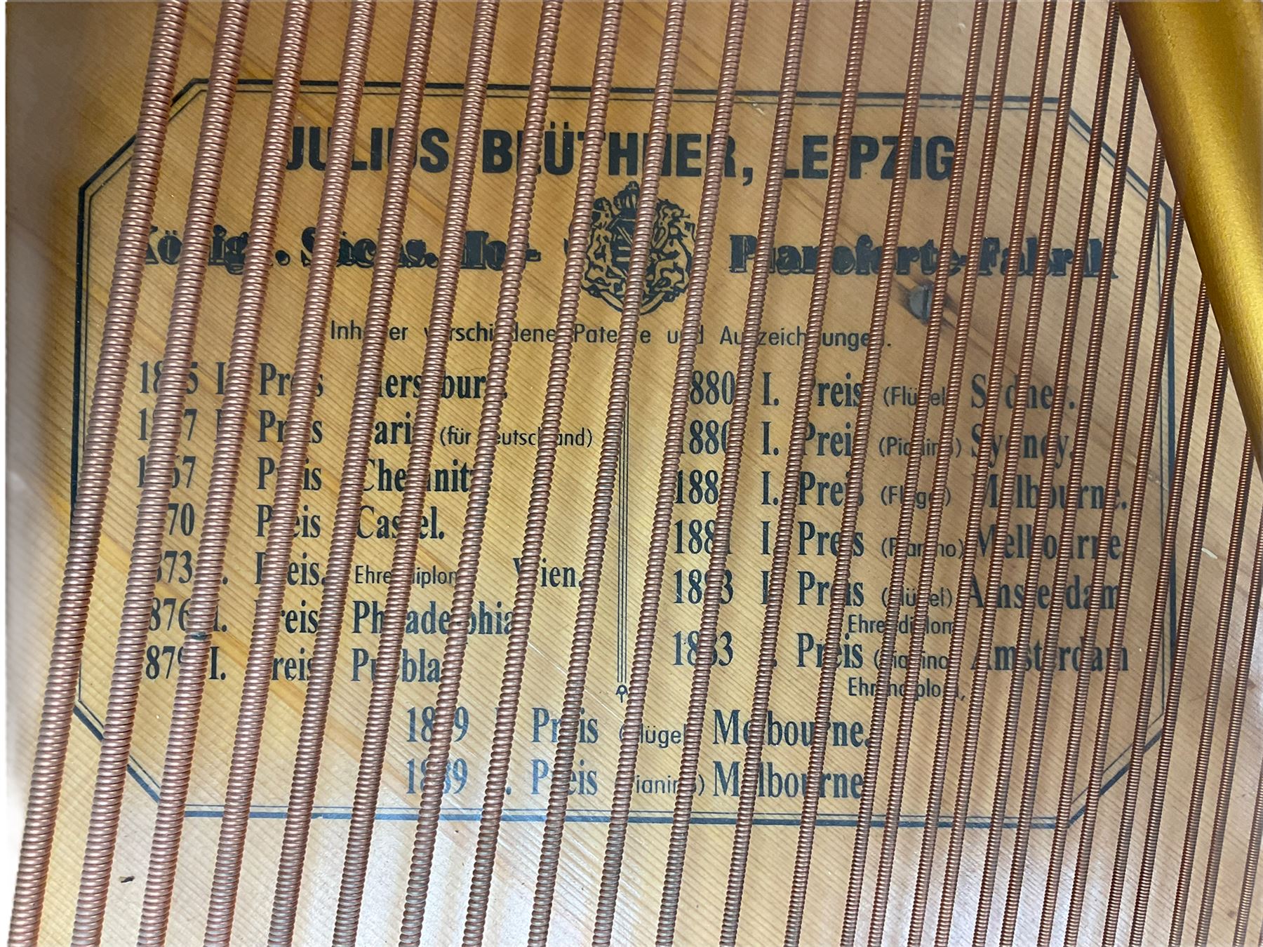Julius Bluthner of Leipzig, Germany - Boudoir Grand Piano in cream lacquered finish with an open lattice music desk, original patent Bluthner action, recently restored and re-strung with new tuning pins, hammer heads and damper felts, re-sprayed iron frame  and re-furbished wooden soundboard with manufacturers decal and traditional 