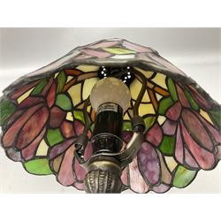 Two Tiffany style lamps, one in the form of a woman with butterfly wings, the other with a floral leaded shade, tallest H33cm
