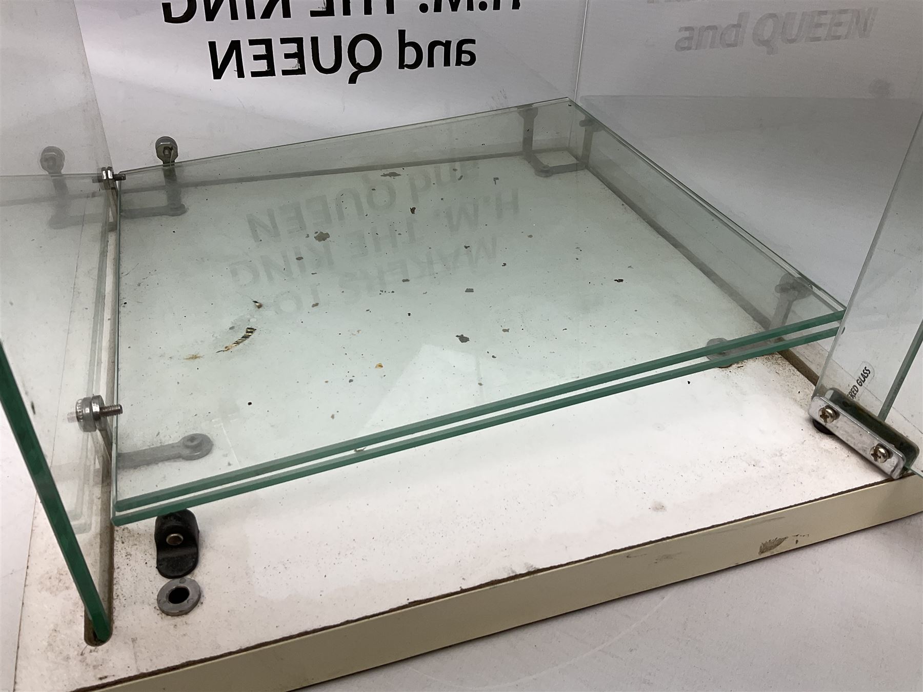 Cadbury's chocolate countertop display advertising cabinet, glazed with 'Cadbury's Makers to T.M The King & Queen', with two glass shelves and a back opening door, H54,5cm