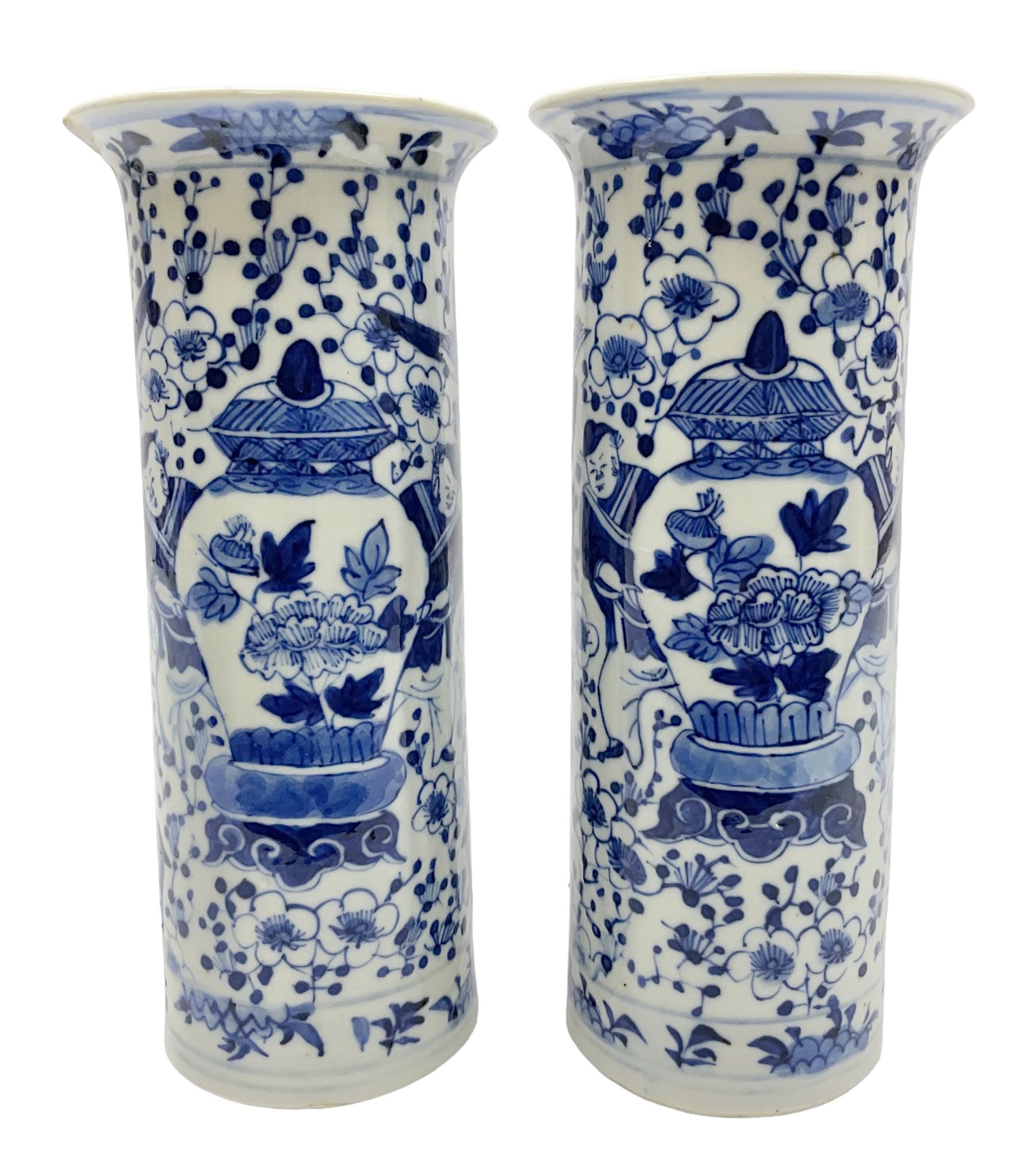 Pair of Chinese blue and white cylindrical vases, decorated with bird and flowers surrounding central figures holding a large vase, H20cm