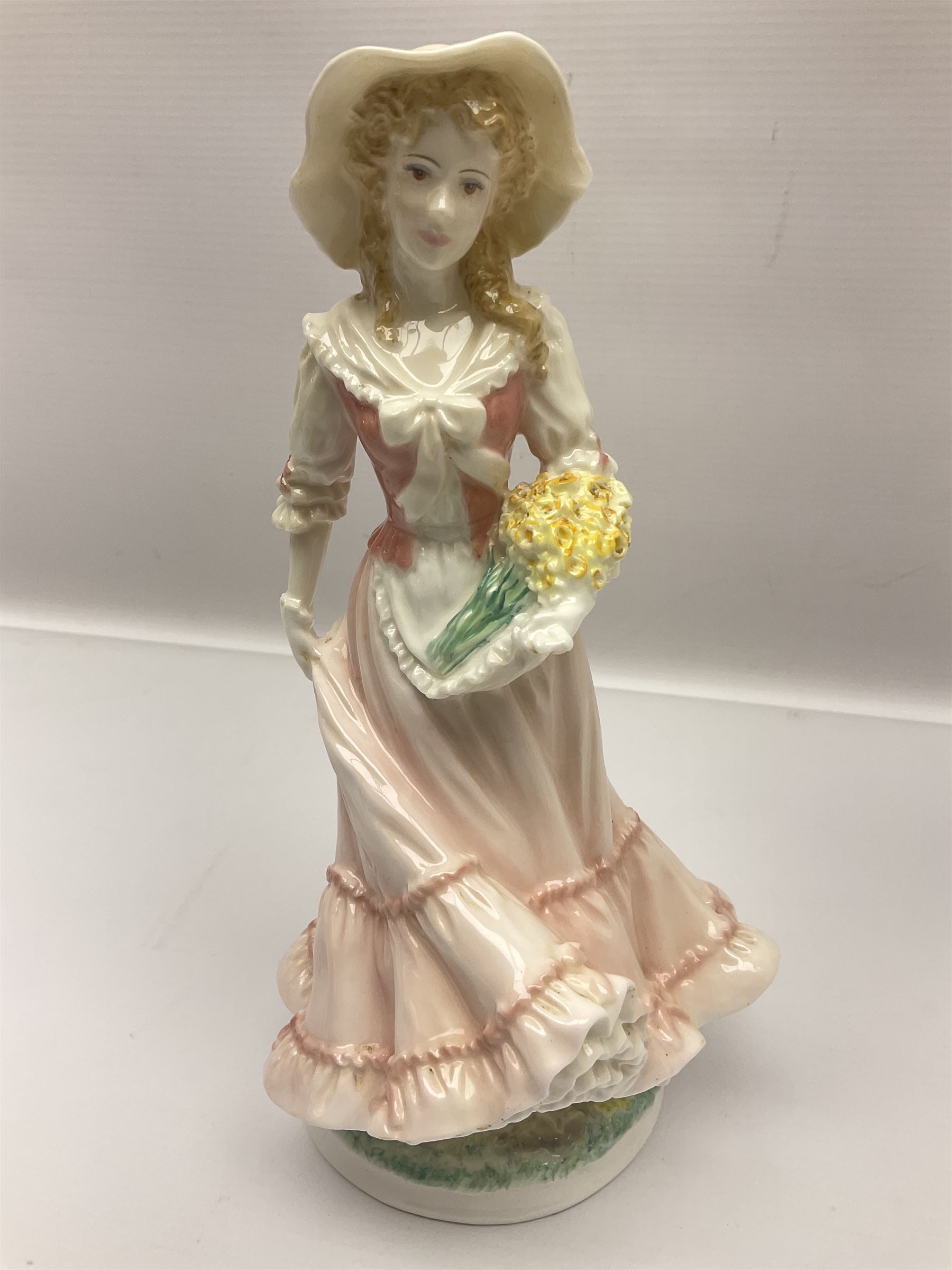 Two Royal Worcester figures, comprising Spirit of the Millennium and Spring, together with Royal Dux figure of two lovers