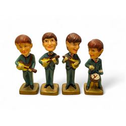 Set of four The Beatles plastic nodding / bobble head figures, H10cm