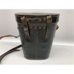 Pair of WWII German U-boat binoculars probably 7 x 50 by Leitz, with rubber eye piece protector covers and leather case stamped with Kriegsmarine mark to the lid and dated 1944, with leather strap.
