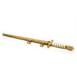 WWII period German Kriegsmarine navel officers dress dagger by Carl Eickhorn, Solingen, with gilded pommel and cross guard with press stud release button, white celluloid grip with wire binding, housed in its original brass scabbard with two hanging rings, the etched double edged blade with Carl Eickhorn, Solingen makers trademark to the base, L39cm