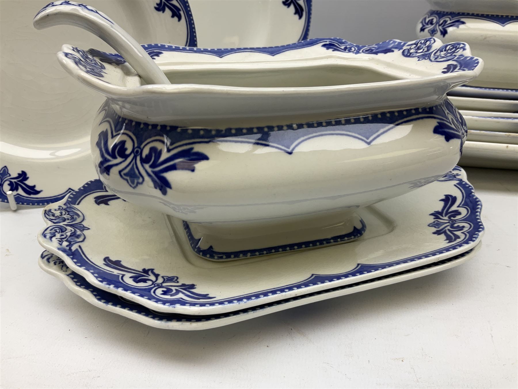 Burgess and Leigh Middleport pottery dinner wares decorated in the ‘Milford’ pattern, to include lidded tureens, graduated meat plates, dinner plates etc 