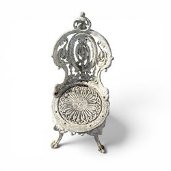 Pair of white painted cast metal garden chairs, ornate reclined backs, circular pierced seats on cabriole legs
