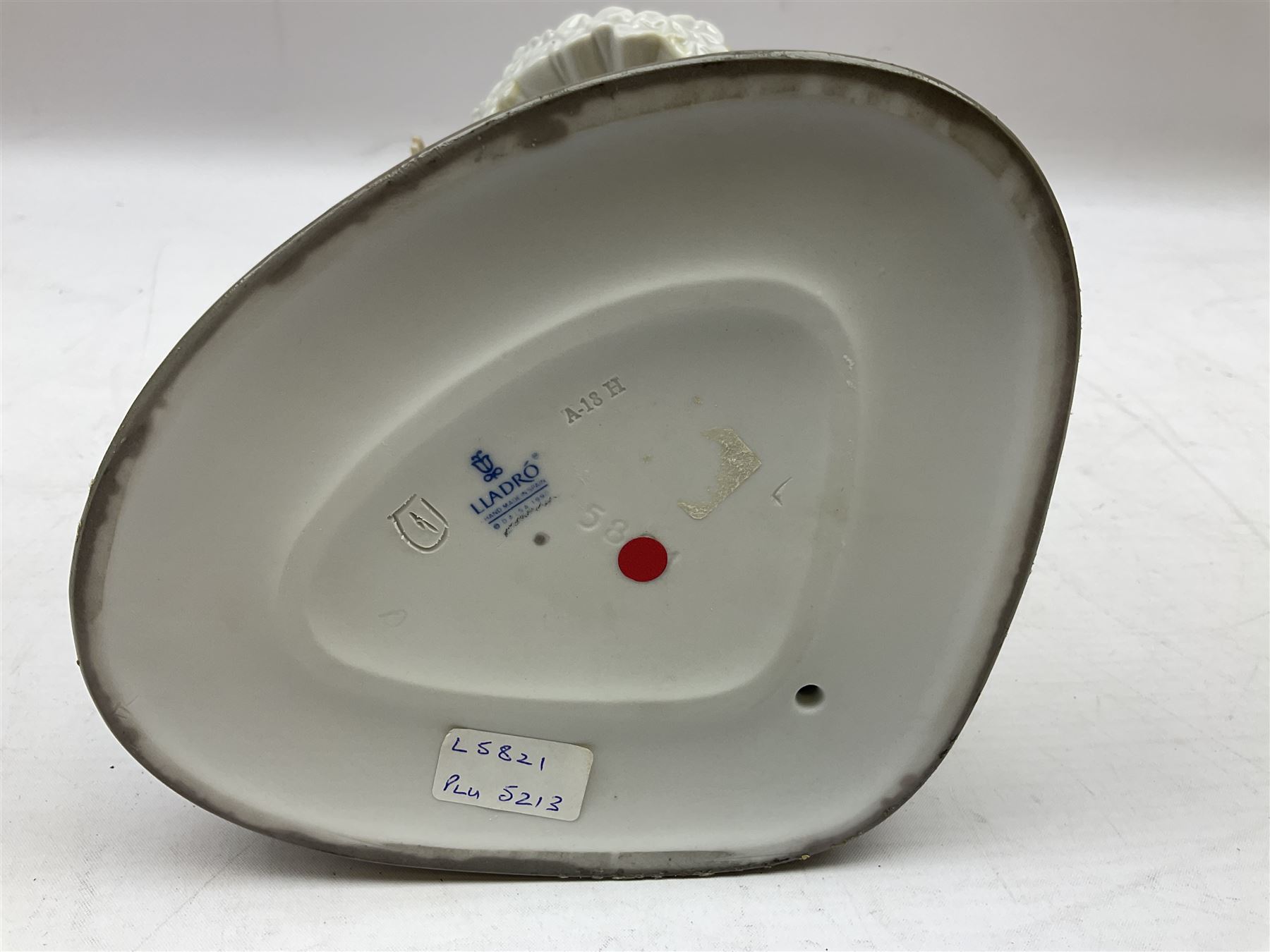 Lladro figure, Minstrel's Love, modelled as a couple entertaining, the lady in ballerina costume playing the lute and the gent stood behind her in jester type dress, sculpted by Rafael Lozano, with original box, no 5821, year issued 1991, year retired 1993, H31cm