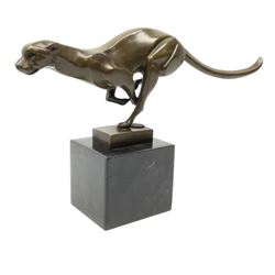 Stylised bronze figure of a running cheetah, with foundry mark, raised upon a marble base, H19cm overall