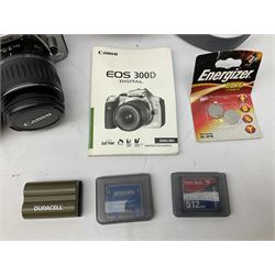 Canon EOS 300D Digital SLR in silver, with Canon 'Zoom Lens EF-S18-55mm 1:3.5-5.6', with soft shell bag and instruction manual