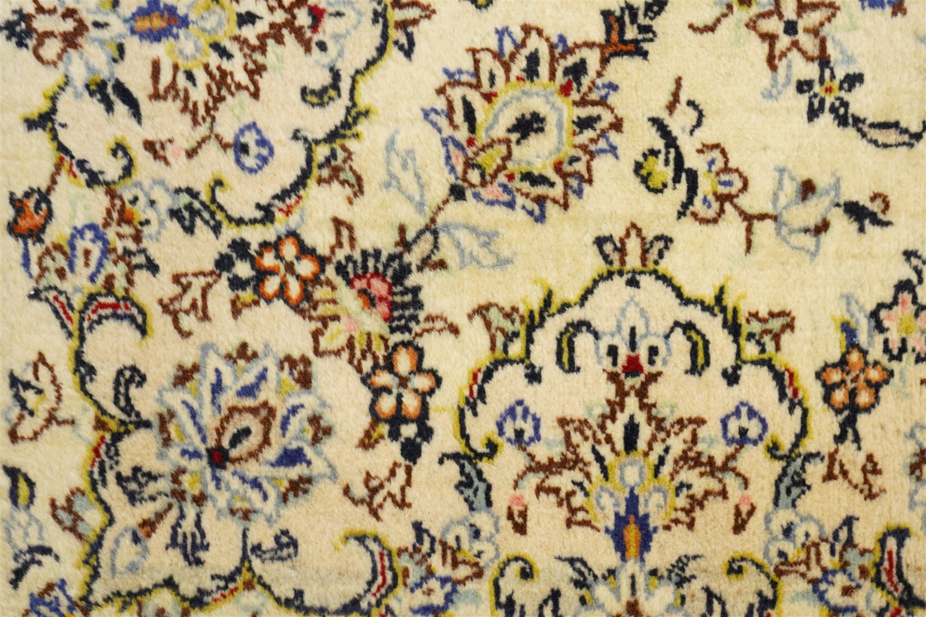West Central Persian Sarough hand-knotted rug, ivory field with central lobed medallion issuing an all-over design of scrolling vines, palmettes, and floral sprays within conforming spandrels enclosed by a complementary foliate border flanked by guard stripes, with cotton fringe ends 