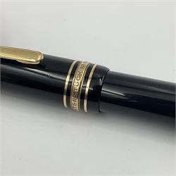 Montblanc Meisterstuck No. 146 fountain pen, the black plastic barrel and cap with gilt clip and banding, and 14ct gold nib marked 4810 14C, L14cm
