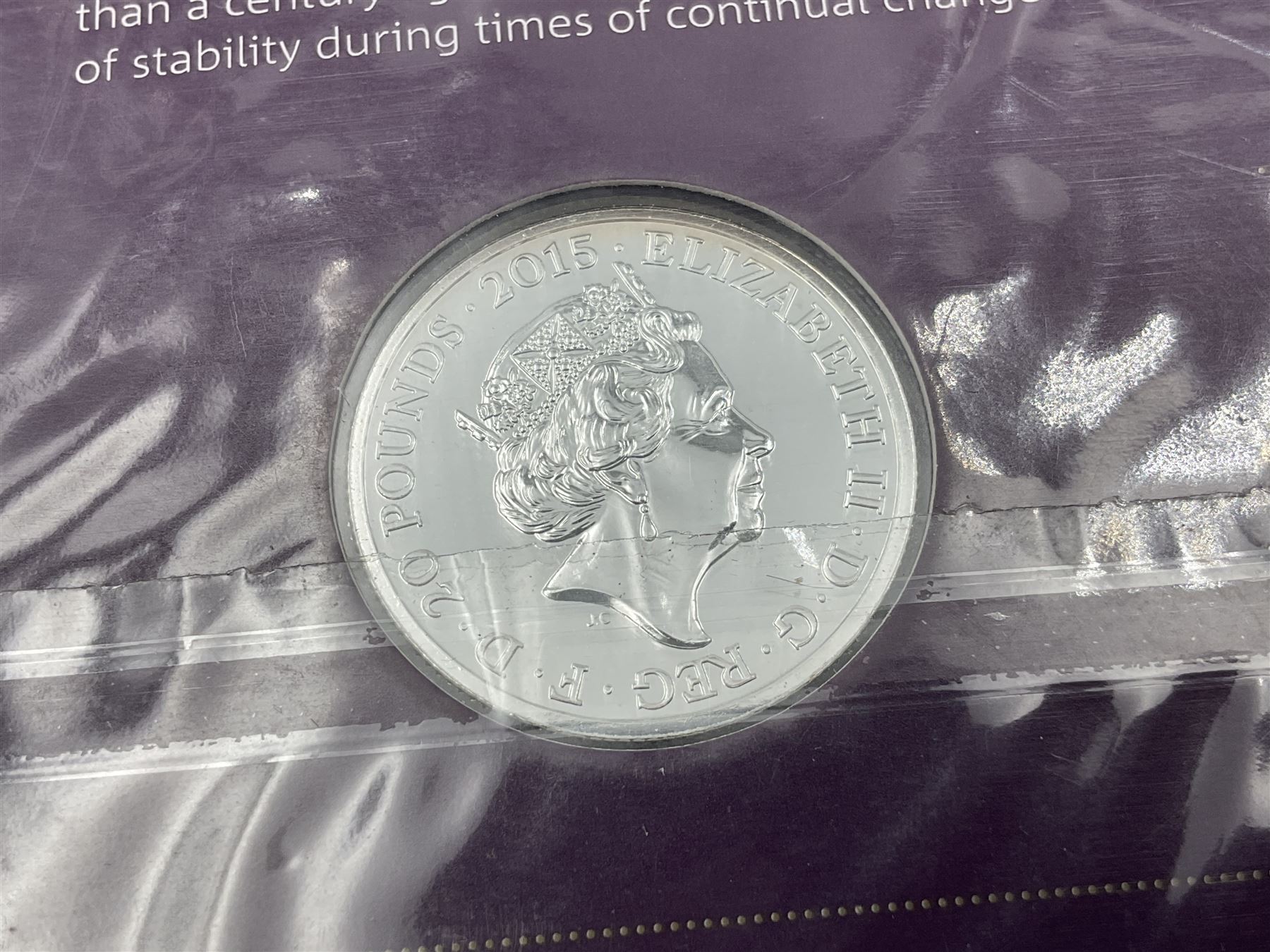 Three The Royal Mint United Kingdom fine silver twenty pound coins, comprising 2014 'Outbreak', 2015 'The Longest Reigning Monarch', 2016 'The 90th Birthday of Her Majesty the Queen', all on cards