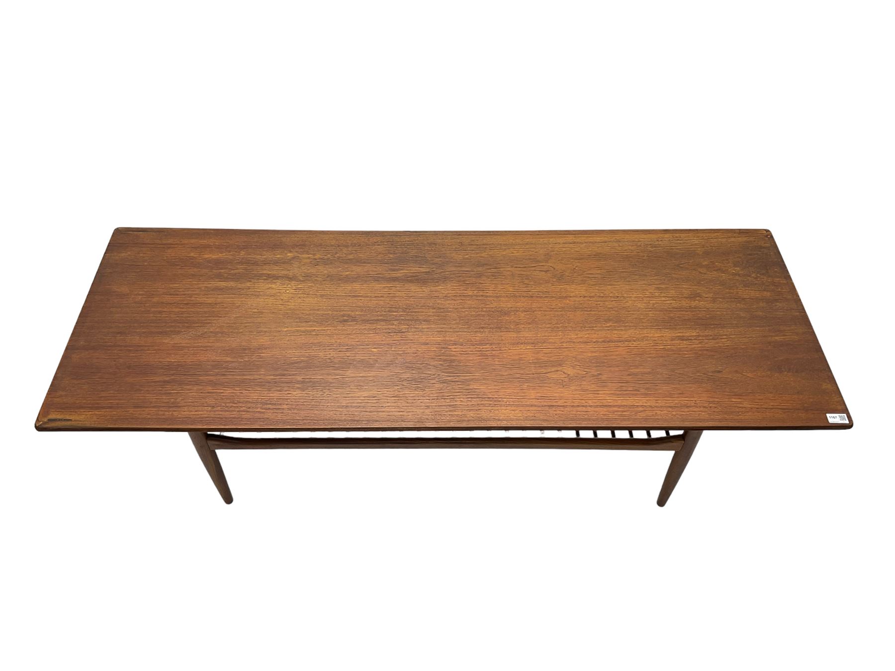 Kofod Larsen for G-Plan - mid-20th century  teak coffee table, rectangular top over spindle slatted undertier, raised on tapering supports 