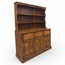 Sam Cryer 'Cryercraft' - elm dresser, three drawers and three panelled cupboards, raised plate rack